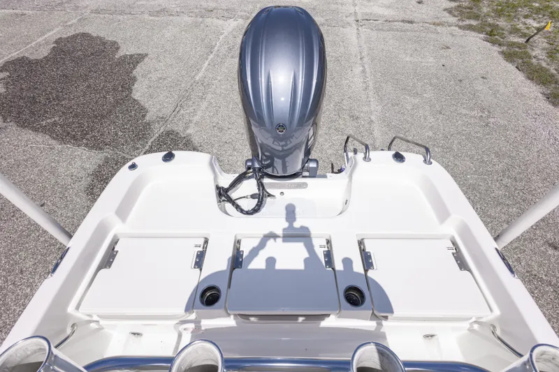 Slide: The Image of 2015 NauticStar 214 XTS boat with outboard motor, viewed from above. - 50