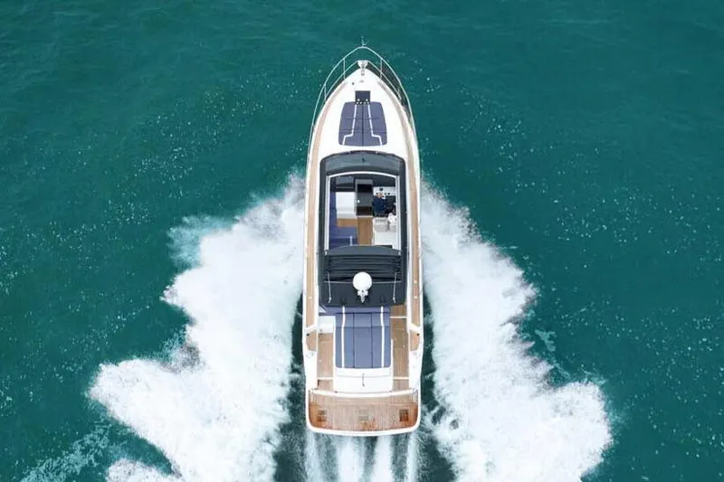 Slide: The Image of Manufacturer Provided Image: 2026 Fairline Targa 50 Edition yacht cruising on open water, aerial view. - 4