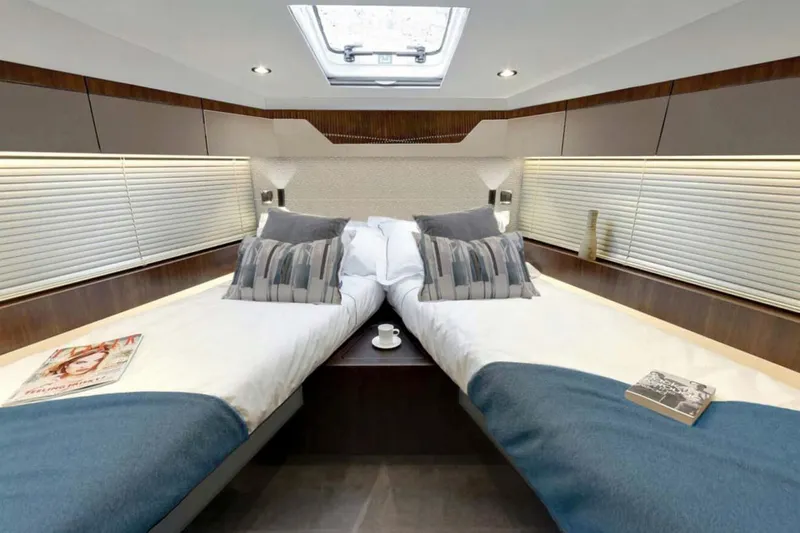 Slide: The Image of Manufacturer Provided Image: Luxurious cabin interior of 2026 Fairline Targa 50 Edition yacht with twin beds. - 8
