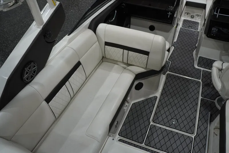Slide: The Image of Luxurious interior of 2018 Sea Ray SLX-W 230 boat with elegant seating and stylish flooring. - 22