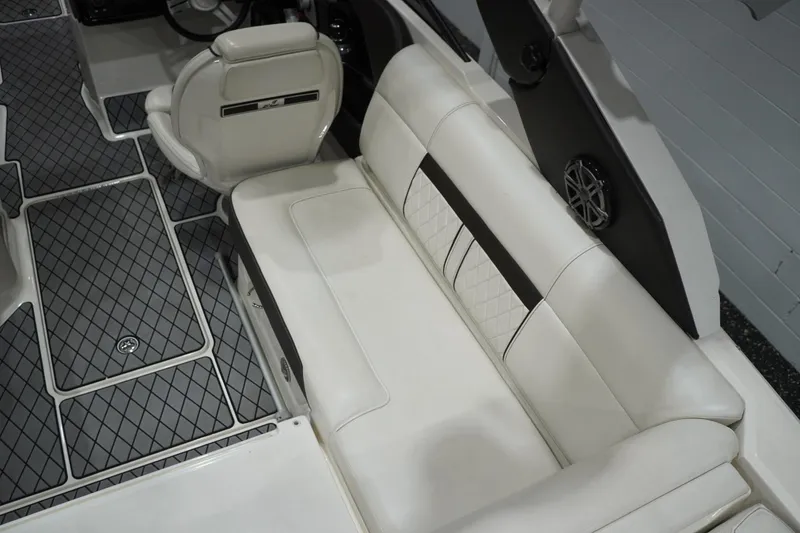 Slide: The Image of Luxurious interior of 2018 Sea Ray SLX-W 230 boat with white seating and stylish flooring. - 23
