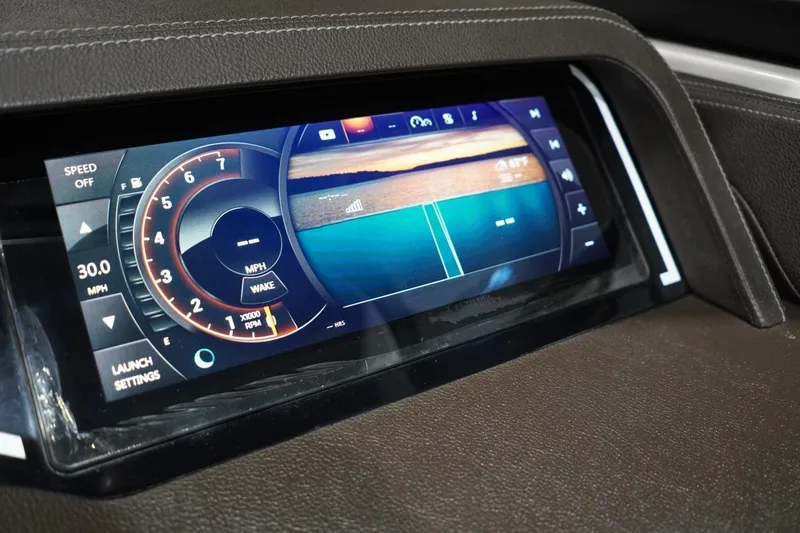 Slide: The Image of Dashboard display of 2018 Sea Ray SLX-W 230 boat, showing speed and settings. - 30