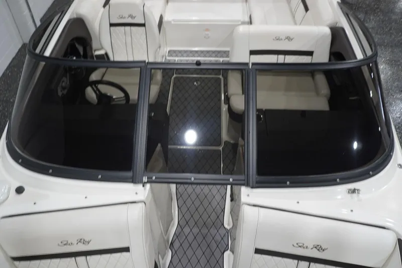 Slide: The Image of 2018 Sea Ray SLX-W 230 boat interior with sleek seating and modern design. - 43