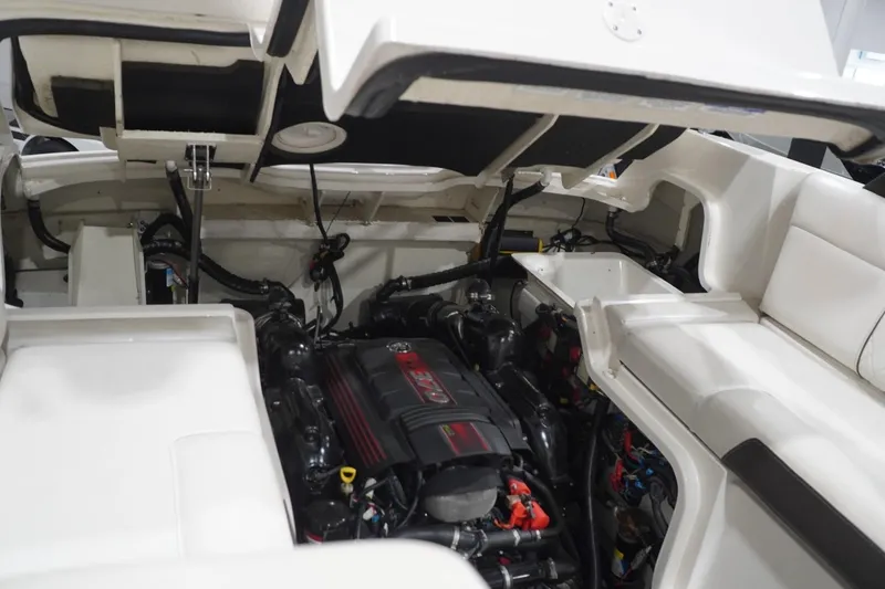Slide: The Image of Engine compartment of 2018 Sea Ray SLX-W 230 boat, showcasing detailed mechanical components. - 57
