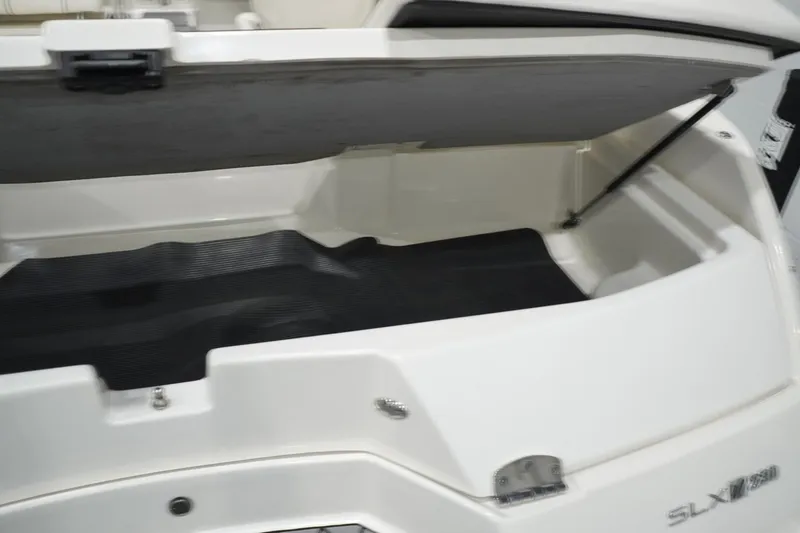 Slide: The Image of Open storage compartment of 2018 Sea Ray SLX-W 230 boat. - 64