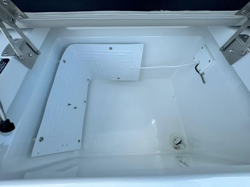 Slide: The Image of Interior storage compartment of 2025 Cruisers Yachts 50 GLS Outboard. - 27