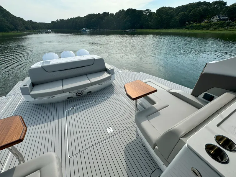 Slide: The Image of Luxurious Cruisers Yachts 50 GLS deck with seating area, 2025 model. - 44