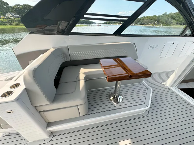 Slide: The Image of Luxurious seating area on the 2025 Cruisers Yachts 50 GLS. - 47