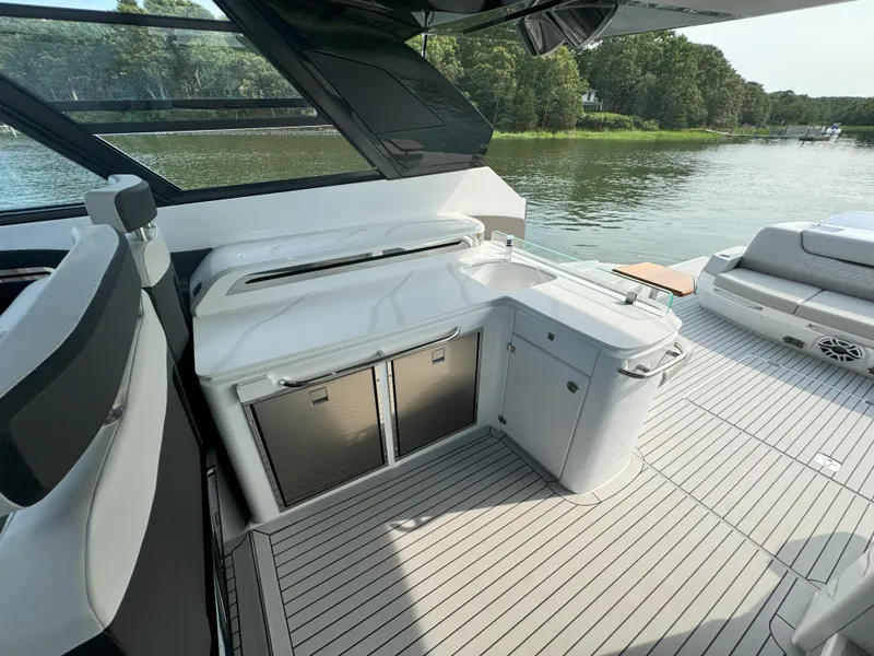 Slide: The Image of Luxurious kitchen on the 2025 Cruisers Yachts 50 GLS. - 48