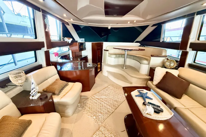 Slide: The Image of Luxurious interior of a 2011 Meridian 391 Sedan yacht with elegant seating and decor. - 14