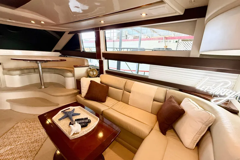 Slide: The Image of Luxurious interior of 2011 Meridian 391 Sedan yacht with plush seating and elegant decor. - 15