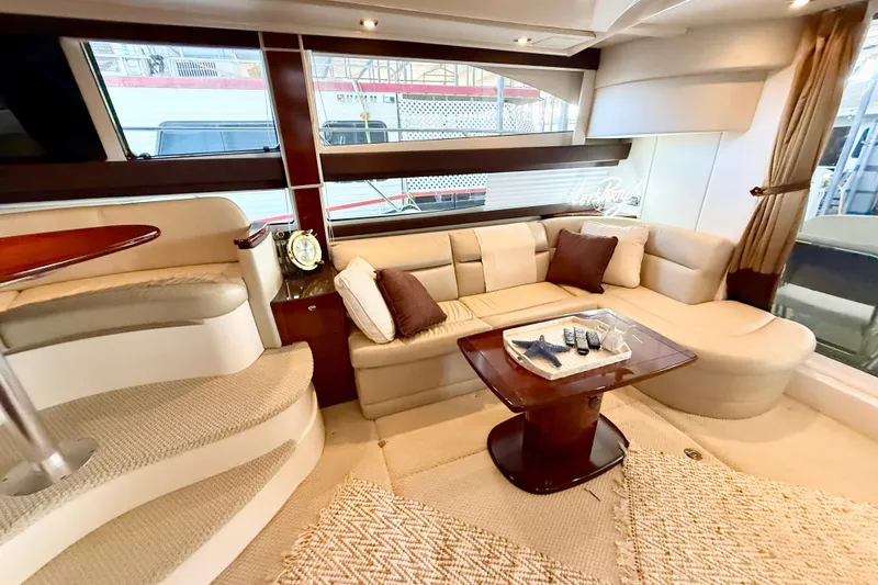 Slide: The Image of Luxurious interior of 2011 Meridian 391 Sedan yacht with plush seating and elegant decor. - 17