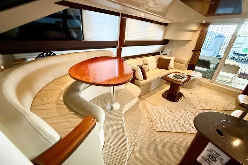 Slide: The Image of Luxurious interior of a 2011 Meridian 391 Sedan yacht with plush seating and elegant decor. - 18