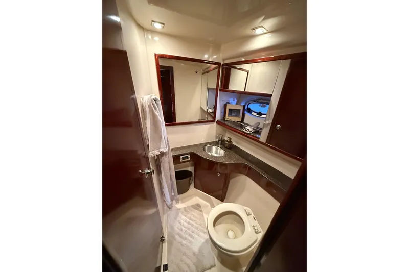 Slide: The Image of Luxurious bathroom in 2011 Meridian 391 Sedan yacht with modern fixtures and elegant design. - 24