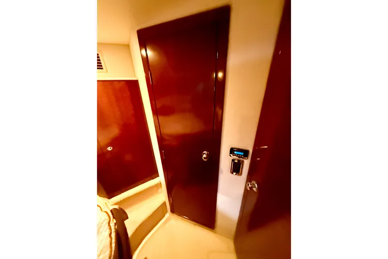 Slide: The Image of Interior view of 2011 Meridian 391 Sedan yacht with wooden doors and modern design. - 31