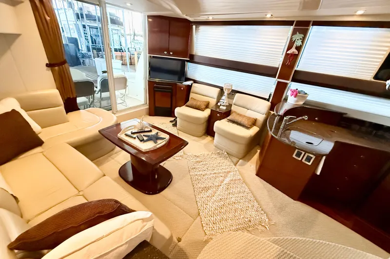Slide: The Image of Luxurious interior of 2011 Meridian 391 Sedan yacht with plush seating and elegant decor. - 33