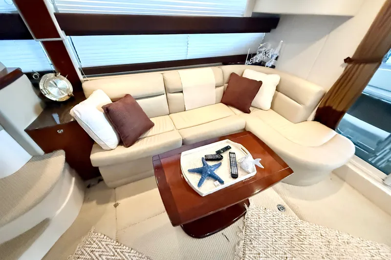 Slide: The Image of Luxurious interior of 2011 Meridian 391 Sedan yacht with plush seating and elegant decor. - 34