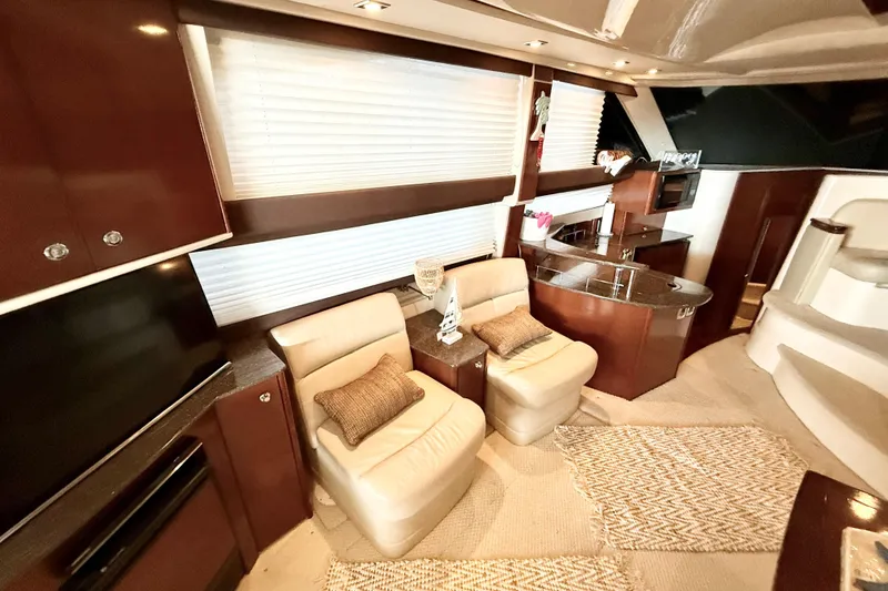 Slide: The Image of Luxurious interior of 2011 Meridian 391 Sedan yacht with plush seating and modern amenities. - 35