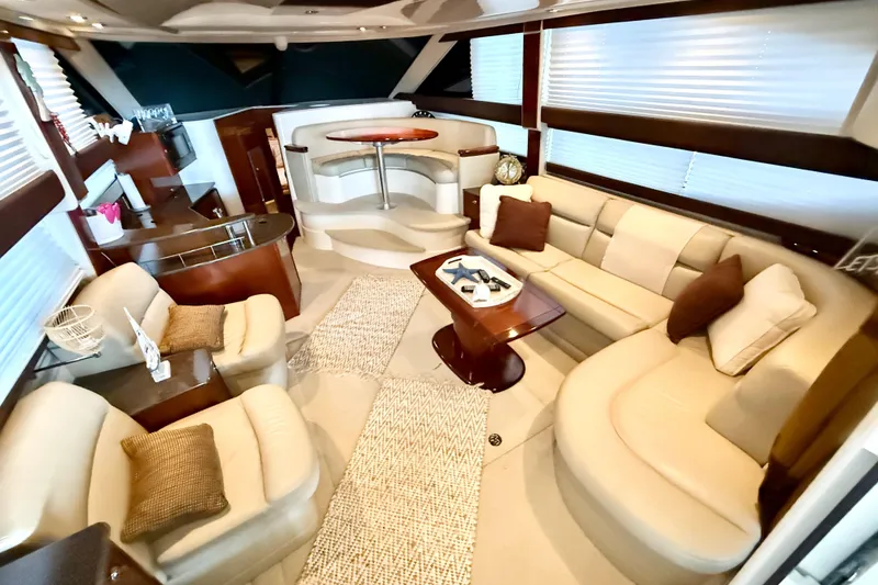 Slide: The Image of Luxurious interior of a 2011 Meridian 391 Sedan yacht with elegant seating and modern decor. - 36