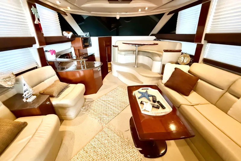 Slide: The Image of Luxurious interior of a 2011 Meridian 391 Sedan yacht with plush seating and elegant decor. - 38