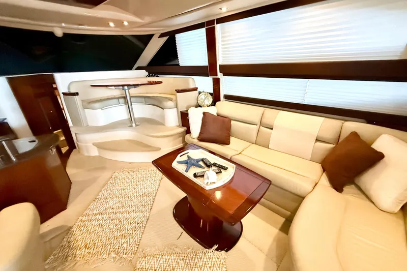 Slide: The Image of Luxurious interior of 2011 Meridian 391 Sedan yacht with plush seating and elegant decor. - 39