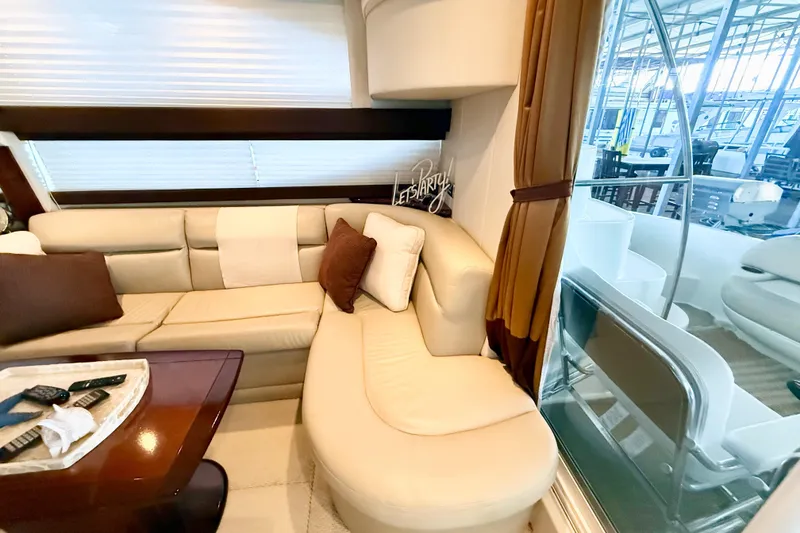 Slide: The Image of Luxurious interior of 2011 Meridian 391 Sedan yacht with plush seating and elegant decor. - 40