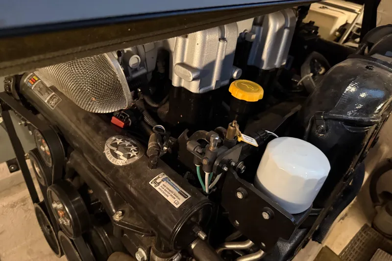 Slide: The Image of Engine of a 2011 Meridian 391 Sedan, showcasing detailed components and design. - 44