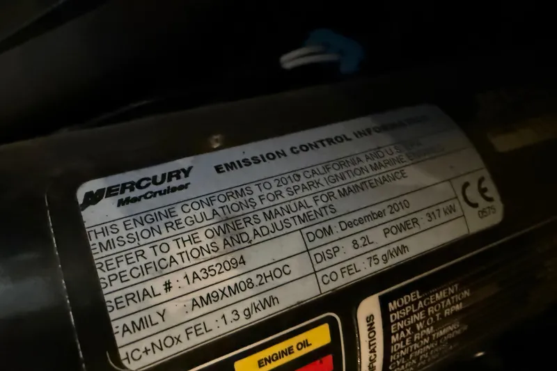 Slide: The Image of Mercury MerCruiser engine emission control label on 2011 Meridian 391 Sedan. - 46