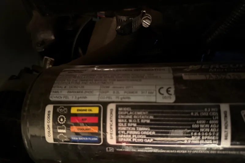 Slide: The Image of Engine specifications label on a 2011 Meridian 391 Sedan boat. - 47