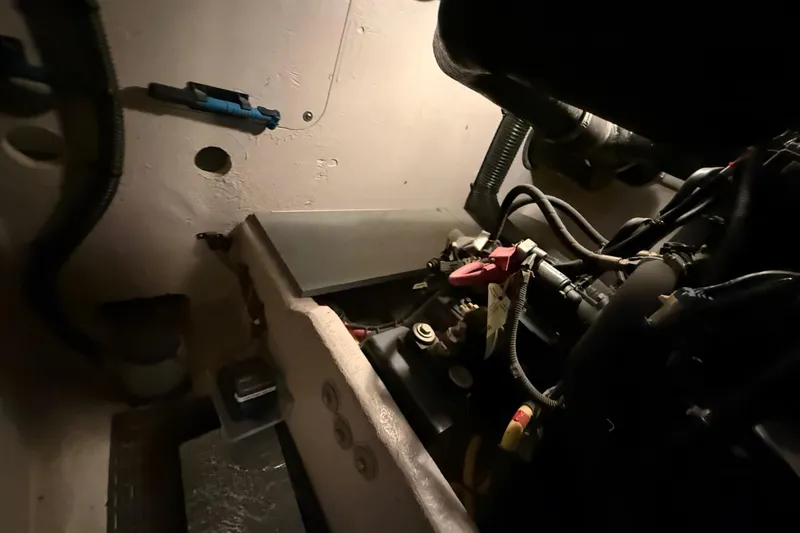 Slide: The Image of Engine compartment of a 2011 Meridian 391 Sedan boat, showing mechanical components. - 50
