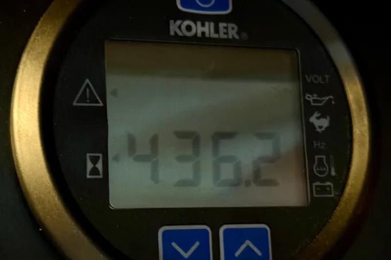 Slide: The Image of Kohler digital display showing 436.2 hours on a Meridian 391 Sedan 2011. - 56