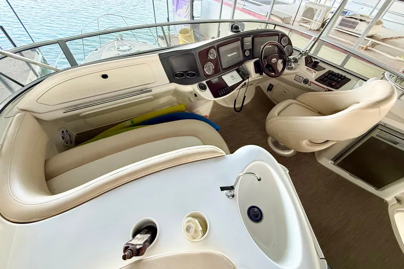 Slide: The Image of Interior of 2011 Meridian 391 Sedan yacht with helm, seating, and sink. - 6