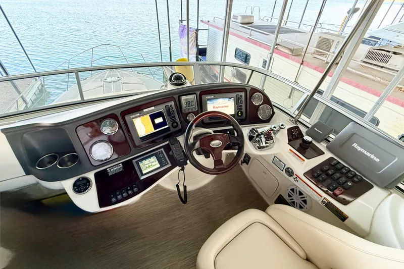 Slide: The Image of Helm of 2011 Meridian 391 Sedan with navigation equipment and steering wheel. - 9