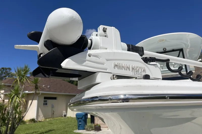 Slide: The Image of 2020 Sea Hunt BX 25 FS boat with Minn Kota Terrova trolling motor, sunny day background. - 13