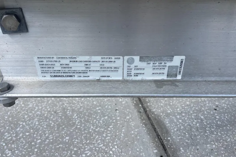 Slide: The Image of Label on Continental trailer showing specifications and VIN for Sea Hunt BX 25 FS, 2020. - 30