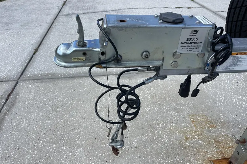 Slide: The Image of Trailer hitch with Dexter DX7.5 surge actuator for 2020 Sea Hunt BX 25 FS boat. - 31