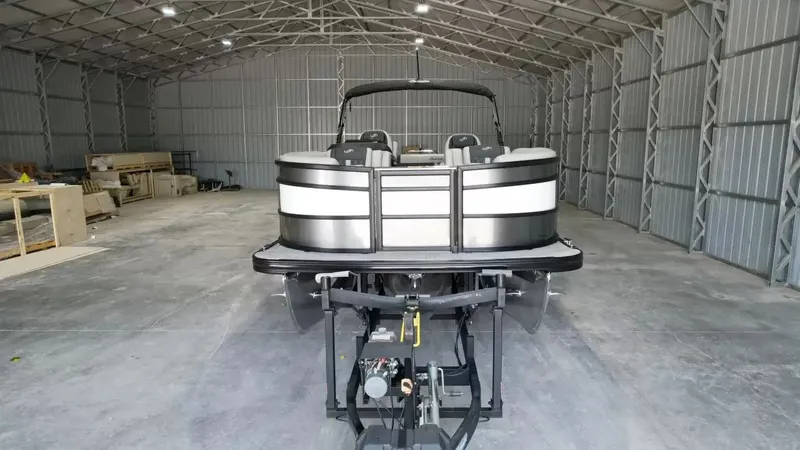 Slide: The Image of 2026 Barletta Lusso L23UC pontoon boat in storage facility. - 18