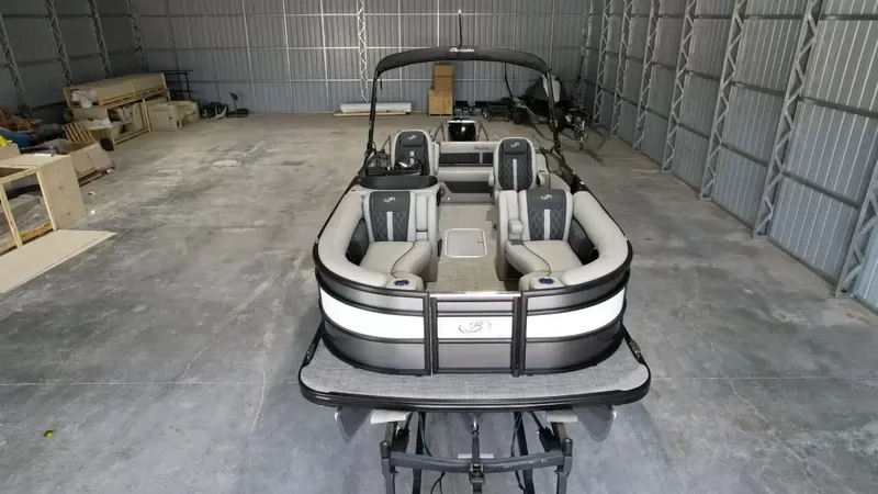 Slide: The Image of 2026 Barletta Lusso L23UC pontoon boat in storage facility. - 19