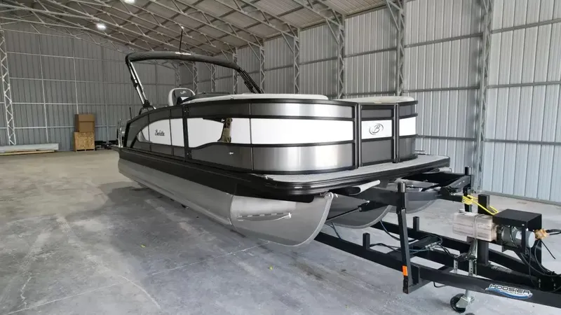 Slide: The Image of 2026 Barletta Lusso L23UC pontoon boat in storage facility. - 20