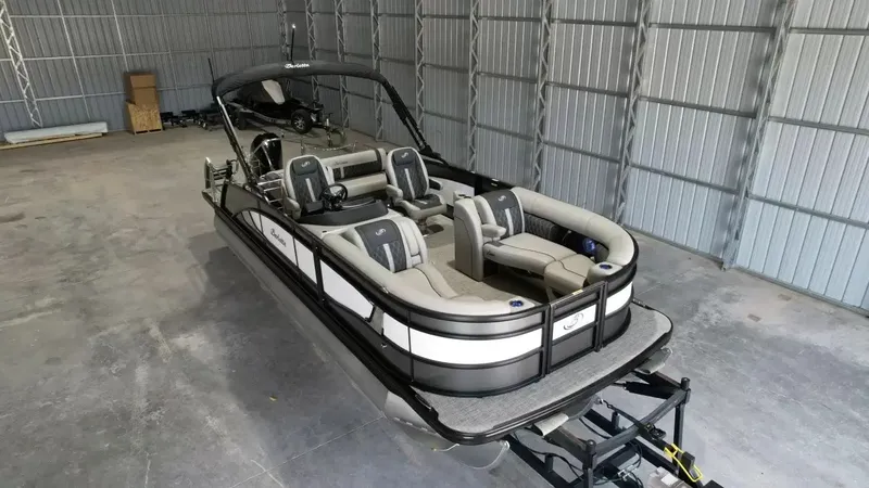 Slide: The Image of 2026 Barletta Lusso L23UC pontoon boat in storage facility. - 21