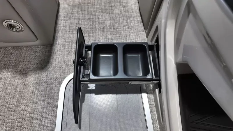 Slide: The Image of Barletta Lusso L23UC 2026 with pull-out cup holder on carpeted floor. - 34