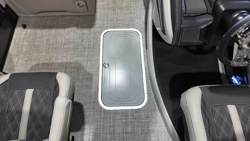 Slide: The Image of Interior of 2026 Barletta Lusso L23UC with sleek seats and floor hatch. - 35