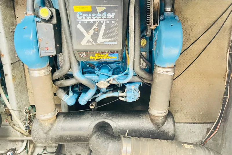 Slide: The Image of Engine compartment of a 1995 Silverton 36 Convertible with Crusader XL engine. - 24