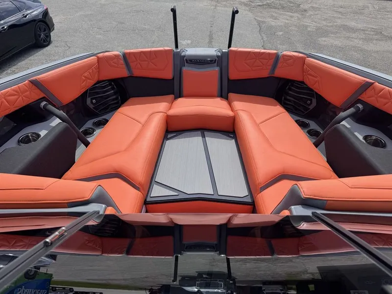 Slide: The Image of Interior of 2026 Nautique Super Air Nautique G25 Paragon with orange seating. - 7