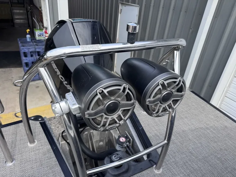 Slide: The Image of 2021 Barletta Boats 23UC with speakers and motor. - 12