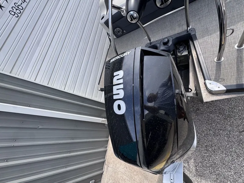 Slide: The Image of 2021 Barletta Boats 23UC with Mercury outboard motor. - 14
