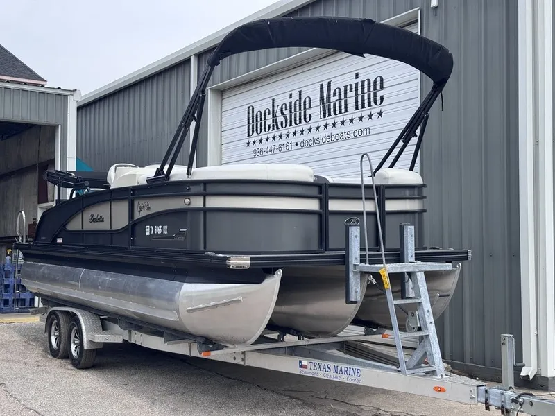 Slide: The Image of 2021 Barletta Boats 23UC pontoon boat on trailer at Dockside Marine. - 2