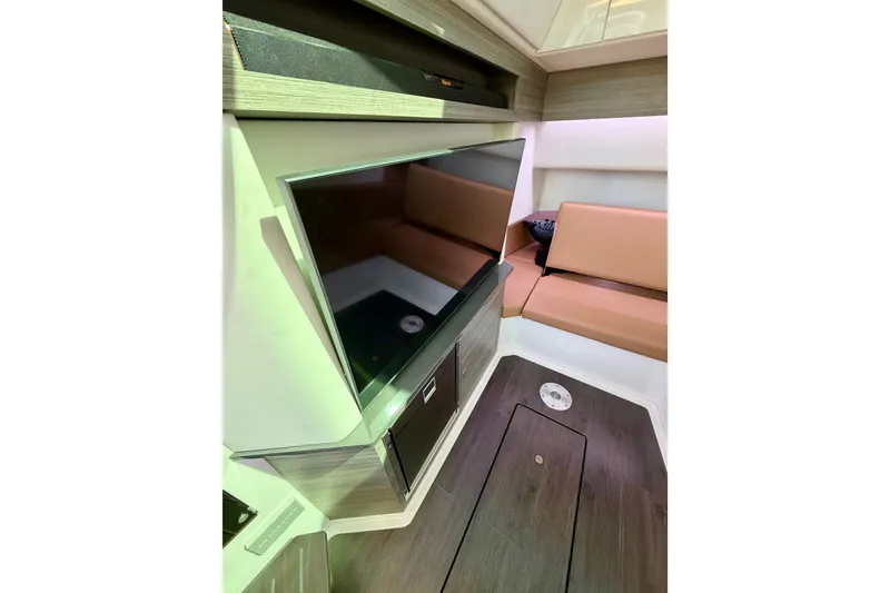 Slide: The Image of Interior of 2023 Aviara AV40 OB boat with TV and seating area. - 13