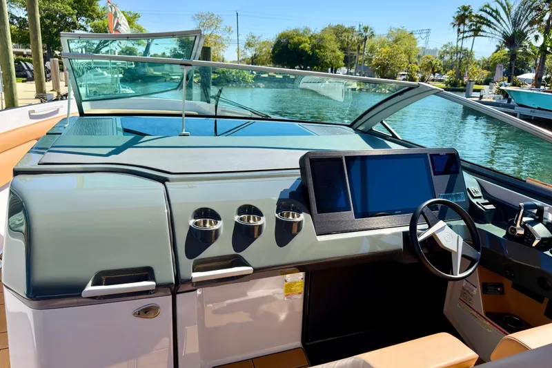 Slide: The Image of 2023 Aviara AV40 OB boat dashboard with modern controls and sleek design. - 18