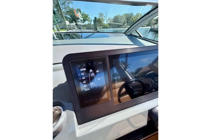 Slide: The Image of Touchscreen control panel on 2023 Aviara AV40 OB boat dashboard. - 21
